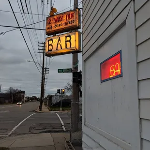 a neon sign for a bar
