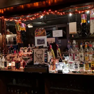 a bar filled with liquor bottles