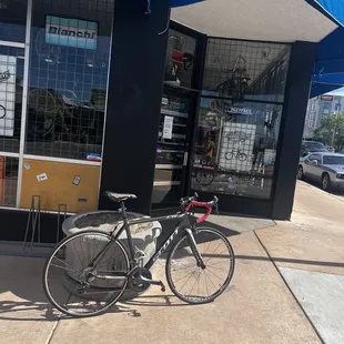 In front of the shop.