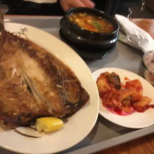 a plate of food on a tray