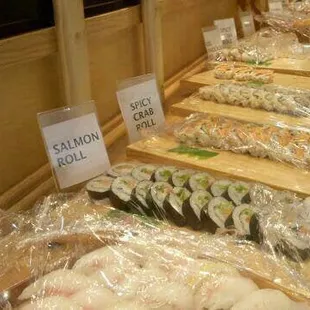 a display of sushi rolls