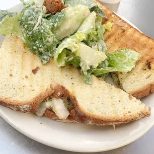 a plate of salad and bread