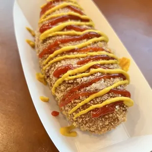 Half cheese and sausage Korean corn dog