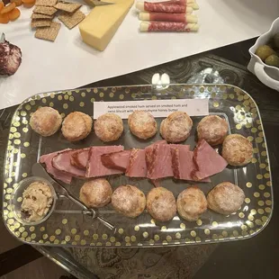 a platter of meat and cheeses