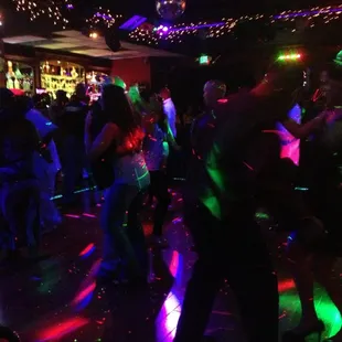 people dancing at a disco