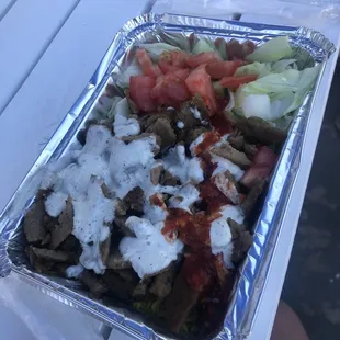 a person sitting at a picnic table