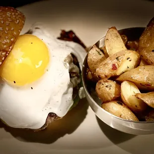 Ultimate burger with dug egg and duck fat fingerling potatoes