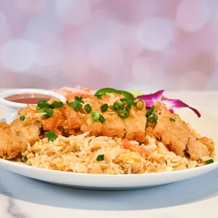 a plate of chicken and rice