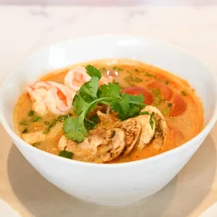 a bowl of soup on a plate