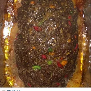 Tyemeka&apos;s Instagram page with a whole meatloaf just baked