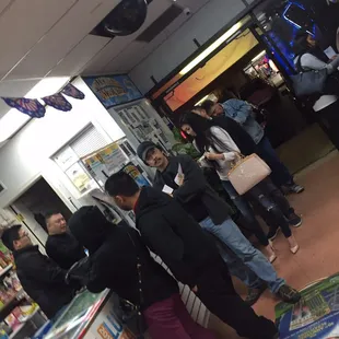 a group of people standing in line