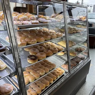 a display case full of donuts