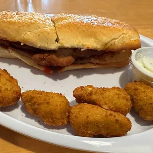 Chicken Parm Sub with a side of Jalapeño Poppers.
