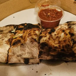 Now that's a Stromboli. I got pepperoni sausage and banana peppers.