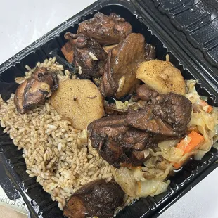Brown stew chicken with white rice