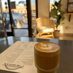 a cup of coffee on a table