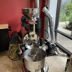 a coffee grinder and a coffee pot