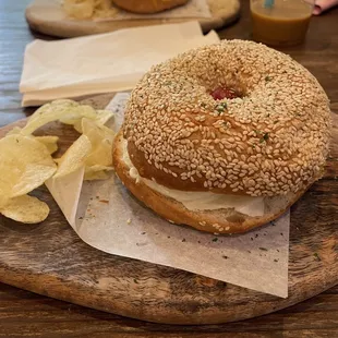 Sesame Bagel sandwich with egg and tomato