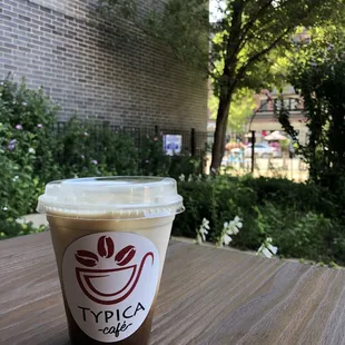 Vanilla latte with almond milk. Addicting! I was also able to work outside around the greenery out front :)