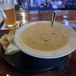Jalapeño popper chicken soup with hickory smoked lime and a side of tortilla chips to dip