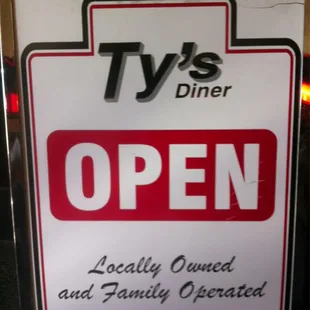 Ty&apos;s open sign
