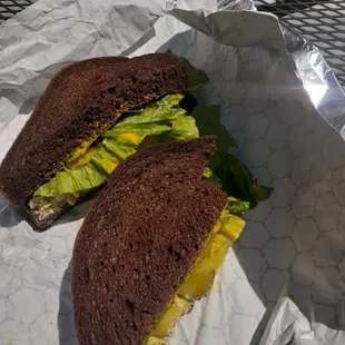 a sandwich with lettuce