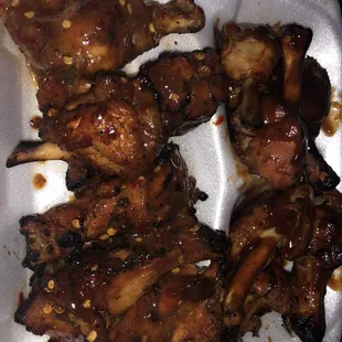 Wings with 2 Flavors. Left jerk. Right henny