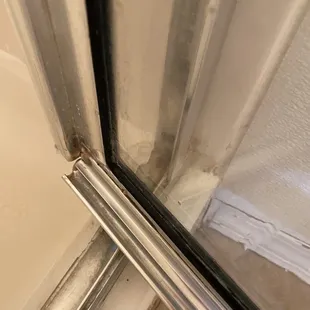 The shower door that has been cleaned