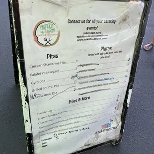 a menu on the side of the truck