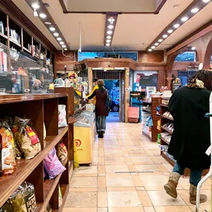 a woman pushing a shopping cart