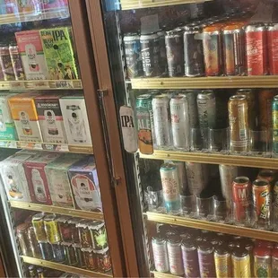 a woman standing in front of a refrigerator