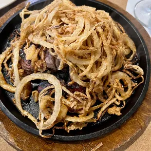 Steak with onion strings