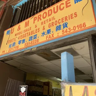 a sign for u &amp; m produce