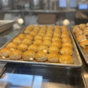 two trays of baked goods