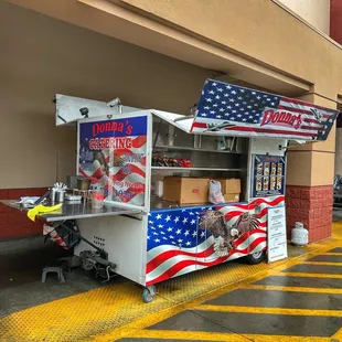 a food cart in a parking lot