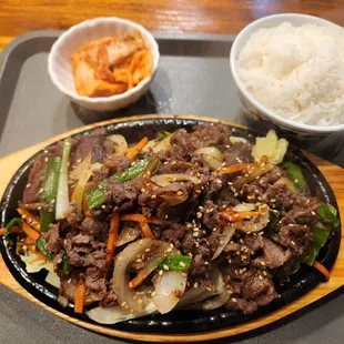 a plate of food on a tray