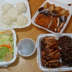 Family Meal Option: Rice, Gyoza and Chicken Katsu, Beef and Chicken Teriyaki, and Salad.