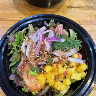 Maki Bowl  2 Proteins and spring mix w/ ponzu  Spicy tuna and salmon  Mango, edamame, red onions, crunches