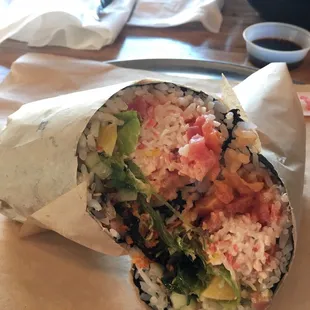 Spicy tuna and spicy salmon with lettuce, cucumber, mango, crab salad, masago, seaweed and spicy mayo sauce