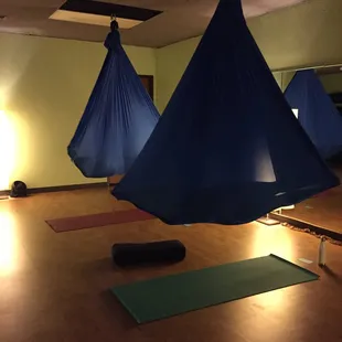 Savasana (resting pose) in aerial hammock.