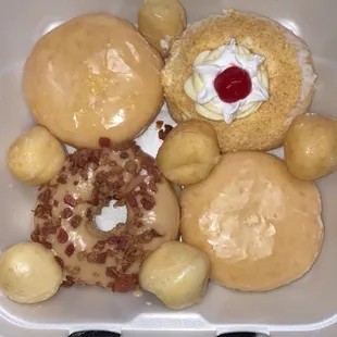 Maple bacon New York cheesecake and they were out of the key lime pie filled lemon and cheesecake filled and some donut holes