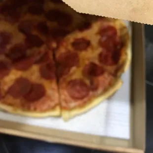  a pepperoni pizza in a box