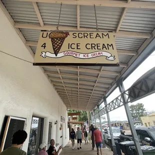 people walking down the sidewalk