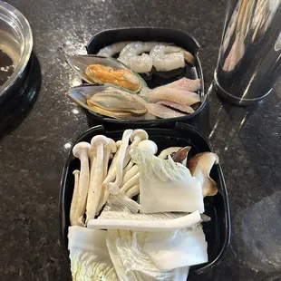 Shrimps, mussels, fish, shiitake mushrooms, white mushrooms, Napa