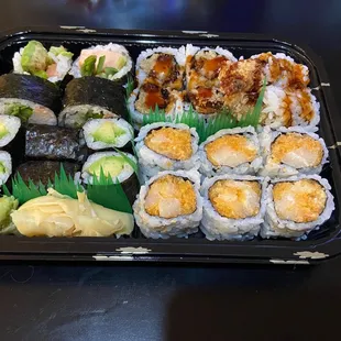 Lobster Maki Roll, Shrimp Tempura Maki Roll, Avocado Maki Roll, and Spicy White Tuna Maki Roll