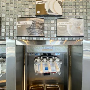 a soda dispenser in a restaurant