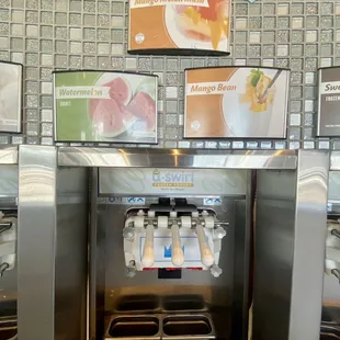 a counter with a variety of drinks