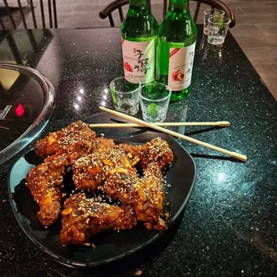 a plate of food with chopsticks