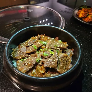 a bowl of beef and vegetables