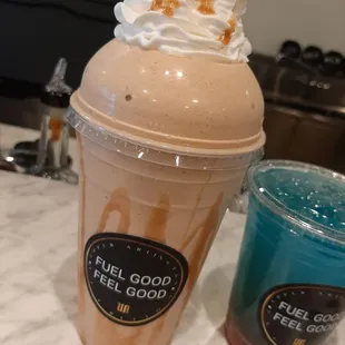 a milkshake with whipped cream and caramel